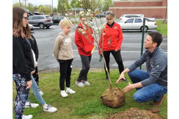 McWane Poles Assistant Environmental Manager is impacting the Coshocton community one tree planting at a time