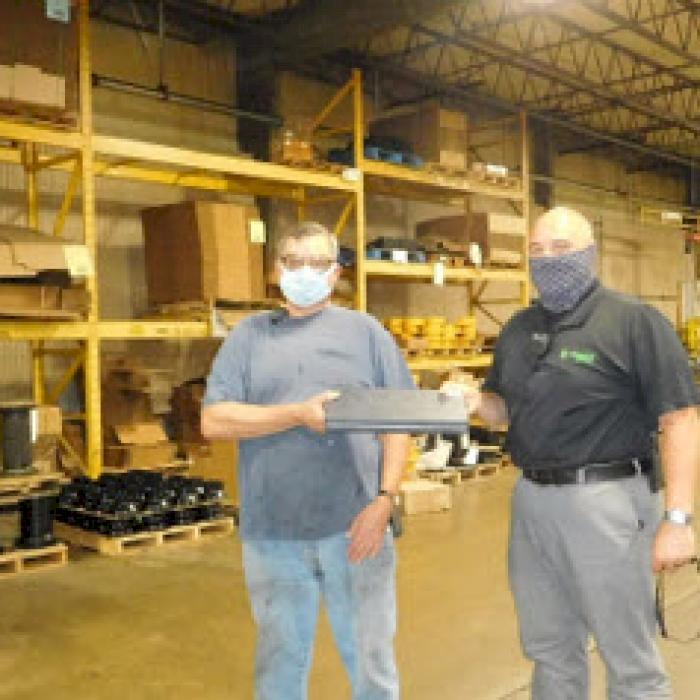 Pictured L-R: Rick Symonds and Assistant General Manager Nate Pizzini