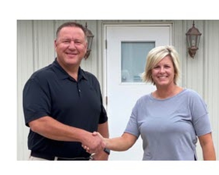 Pictured: Mark Willett (Clow Valve General Manager) and Laura North (OISC Board President)